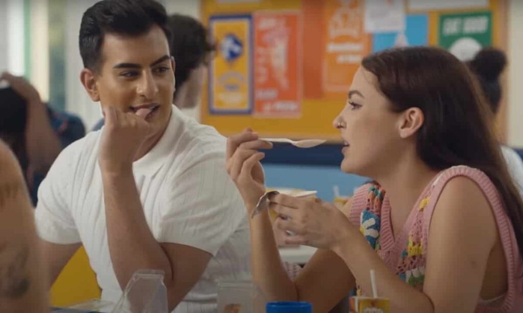 Junaid and Charlie eating ice cream together in Lovestruck High season 2